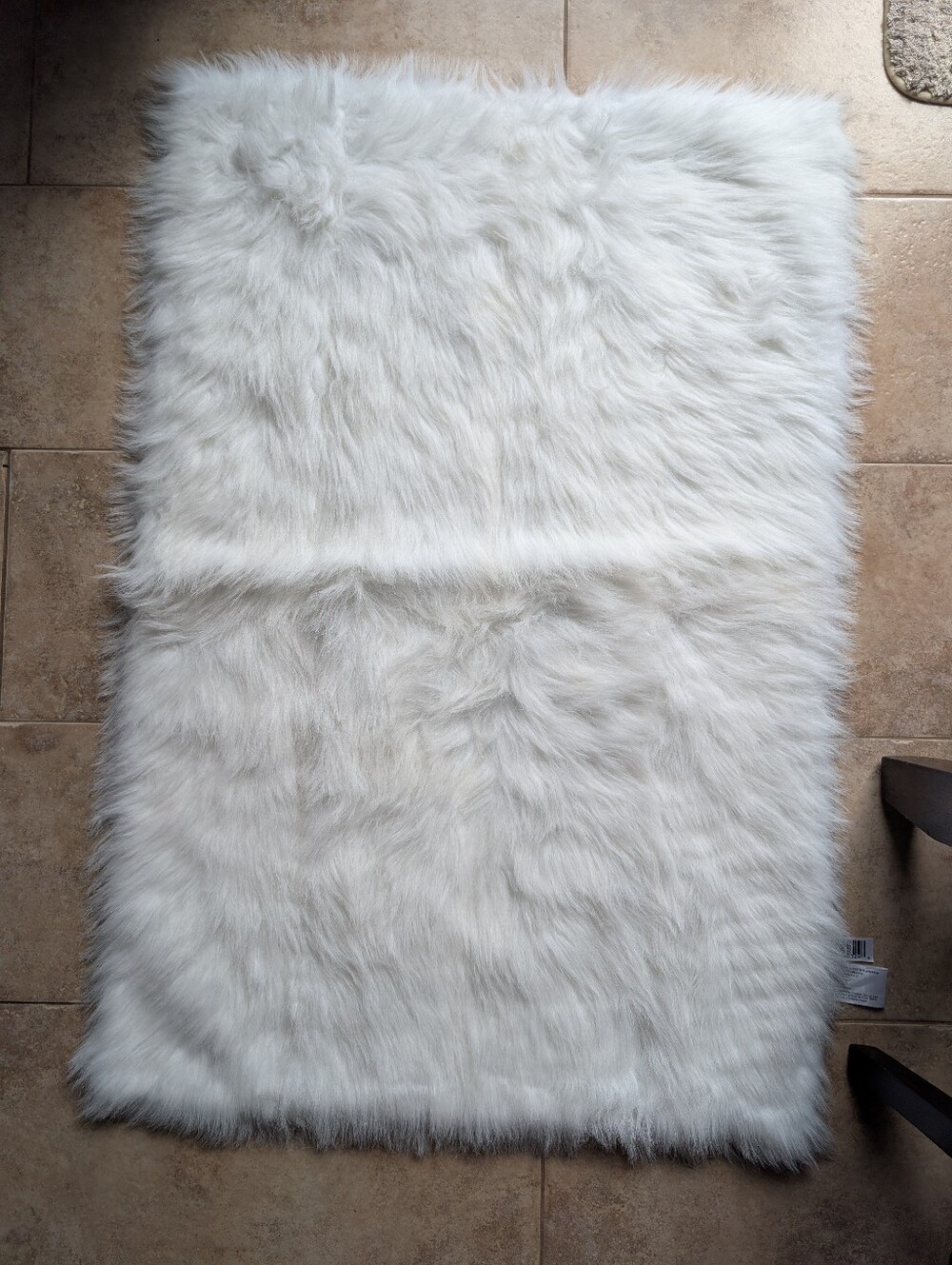 White faux fur rug